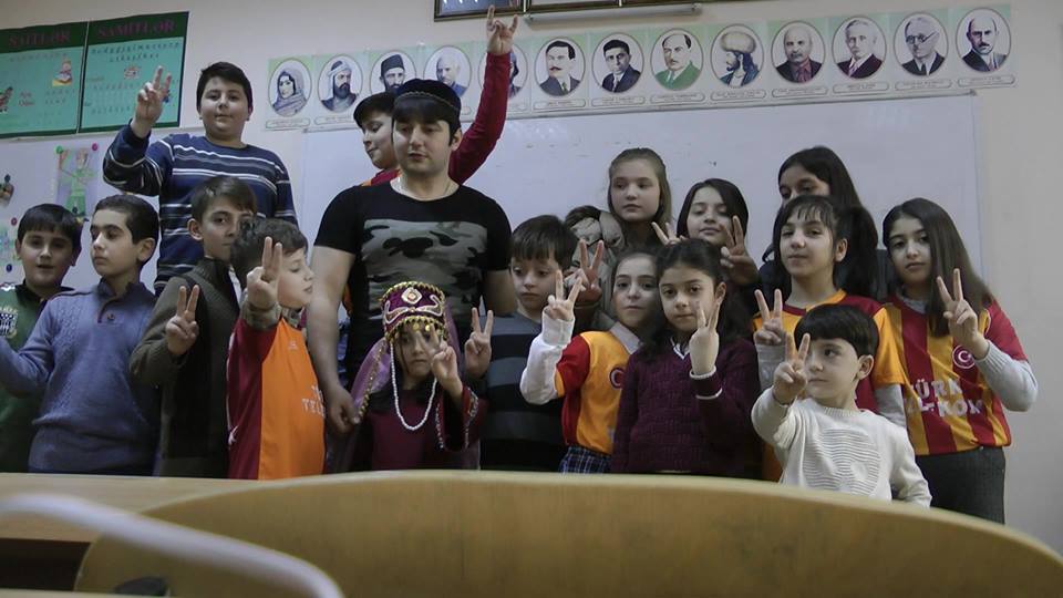 Roshan Azizov with his students.