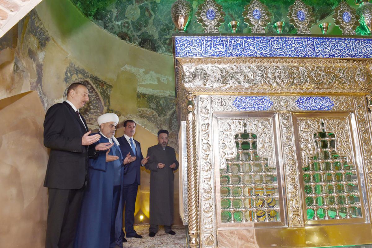 Azerbaijan’s President Ilham Aliyev (left) prays at a religious complex in Ganja. While the president has repeatedly made a point of demonstrating his faith, critics say authorities restrict religious freedoms to the nation’s peril. (Photo: Azerbaijani Presidential Press Service)