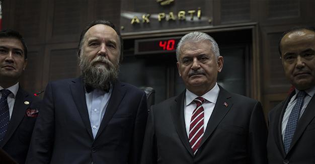 Russian strategist Alexander Dugin (2nd left) stands alongside Turkish PM Binali Yıldırım at a ruling Justice and Development Party (AKP) meeting at the Turkish Parliament in Ankara in Nov. 8, 2016. 