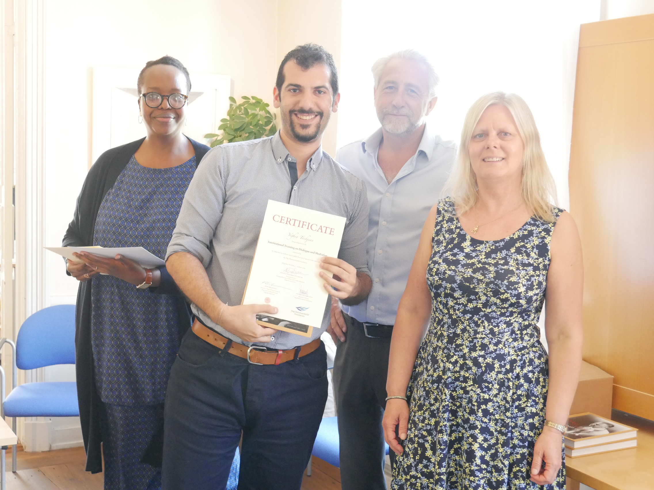 The author during the certificate ceremony at the Dag Hammarskjold Foundation.