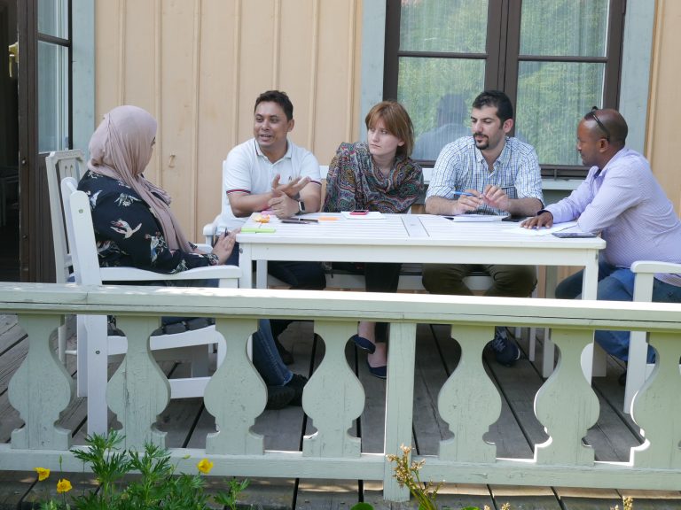 The author, the second from the right with group of participants during a discussion session. 