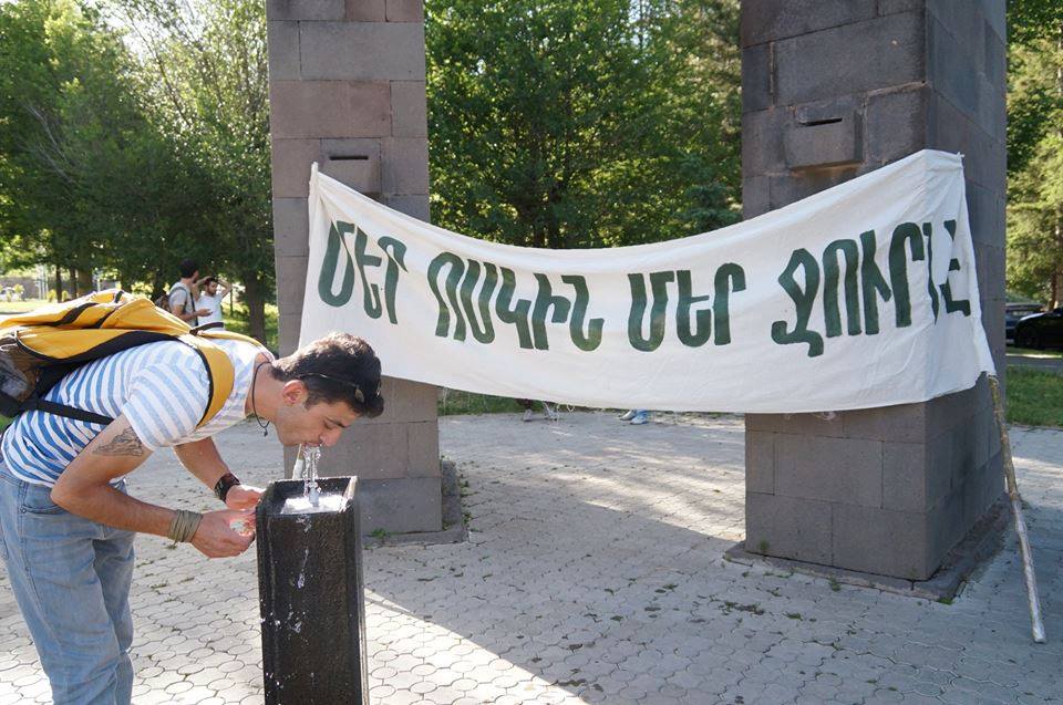 Photograph taken in Jermuk, the poster reads, “Our gold is our water.” (Photo: Tehmine Yenokyan)